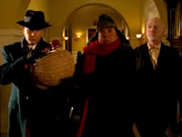 And so it was on a wet December morning, grim and resolute, ready to do or die, Nero Wolfe went out. 