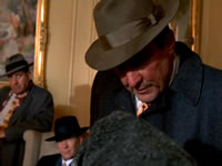 All I wanted was to get my thumbs in a proper position behind Noonan’s ears and bear down. 