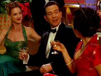 To drink champagne with a blonde at one elbow and a brunette at the other gives a man a great sense of well-being. Merry Christmas.