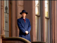 Archie on the stoop of the old brownstone