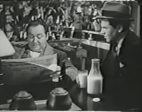 Lionel Stander as Archie and Edward Arnold as Nero Wolfe in MEET NERO WOLFE (1936)
