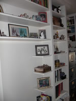 Built-in Bookshelves dot the house