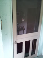 Door built by stout with 3 pet entry doors